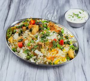 Veg. Biryani [650 ML] + Papad + Raita