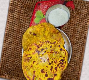 Punjabi aloo paratha with butter and dahi