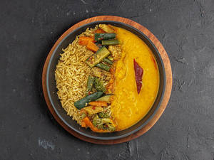 Protein Filled Dal Tadka And Brown Rice Topped With Sauteed Veggies