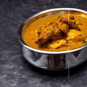 Chicken In Turmeric Sauce