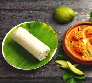 Mango coconut fish curry with white puttu.