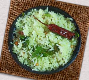 Lemon rice with pickle and papad