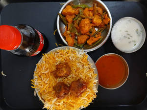Mutton Fry Biryani + Chicken-65 +coke