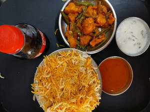 Chicken Biyani Rice Only + Chicken-65 + Coke