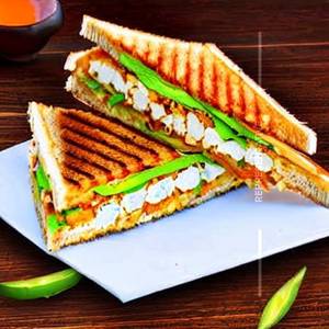 Achari paneer veg club cheese sandwich