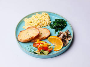 Scrambled Egg With Sauteed Spinach And Vegetables