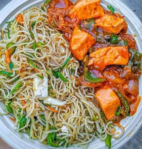 Burnt Garlic Noodles With Paneer In Schezwan Sauce