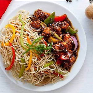 Burnt Garlic Noodles With Chicken In Schezwan Sauce