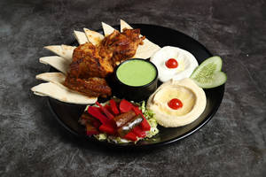 Grilled Chicken  (served With Hummus,pita Bread And Pickle)