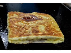 Egg Veechu Parotta
