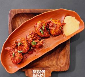 Chicken steamed schezwan momos