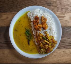 Dal 250Ml Chawal 500 Ml Aalu Bhaja 100Ml