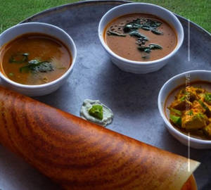 Schezwan Paneer Masala Dosa