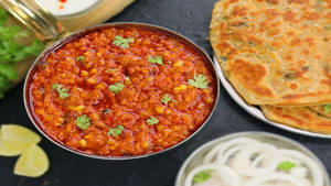 Sev Bhaji With 2 Lachcha Paratha