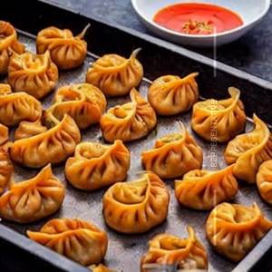 Chicken Butter Garlic Sizzling Momos