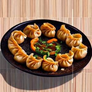 Veg Butter Garlic Sizzling Momos