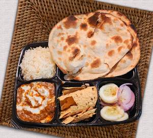 Delux thali butter paneer with roti rice salad papad