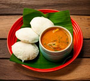 Idli with chicken kulambu