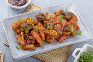 Chilli Garlic Broccoli, Mushroom And Baby Corn
