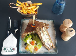 Veg Club Sandwich On Brown Toast