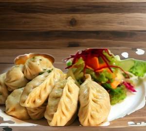 Chicken steamed momos [8 pieces]