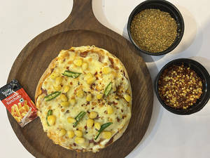 Green Chilli And Corn Pizza