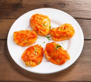 Cheesy chicken momos fried
