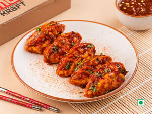 Veg Pan Fried Momo In Hot Garlic Sauce