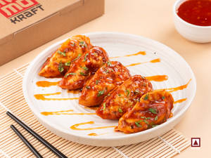Chicken Pan Fried Momo In Sweet Chilly Sauce