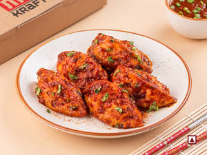 Chicken Pan Fried Momo In Hot Garlic Sauce