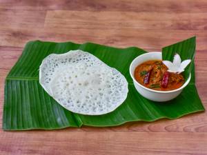 Chicken curry with appam