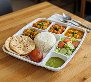 Pure Jain Paneer Thali (Plain Rice, Plain Roti, Paneer Curry, Sabji, Daal, Sweet, Chutney, Salad)
