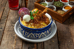 Kolkata Style Murgh Dum Biryani With Anda & Aloo