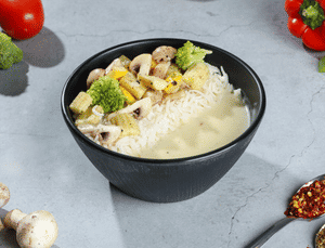Saute Vegetable Rice Bowl In Cheese Sauce
