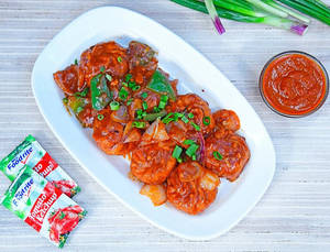 Momos Manchurian (7 Pieces)