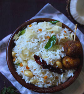 Coconut rice with appalam