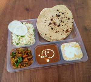 Dal Makhni + Mix Veg + Rice + 4 Roti + Salad