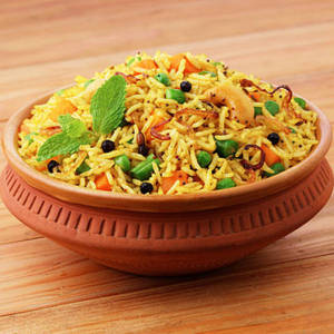 Veg. Biryani (served With Gravy)