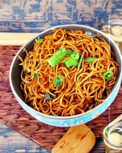 Mushroom schezwan fried noodles