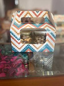 Two jar hamper with assorted Handcrafted Chocolate and dry fruit trail mix