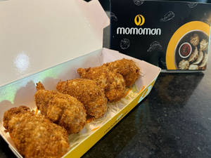 Kurkure Cheesy Chicken Momos