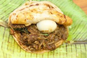 Mutton Kizhi Parotta