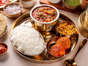 Sindhi Curry Chawal With  Alu Took
