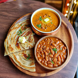Rajma+ Dal Makhani+ Roti| Laccha Paratha| Naan Thali Meal For 1