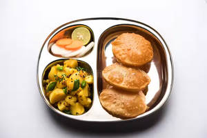 4 pieces  atta poori and sabji