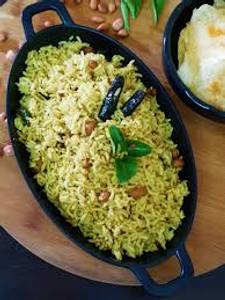 Puliyogar rice
