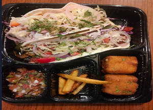 2 Veg Tacos + 2 PCS Of Mac & Cheese Bites + Fries