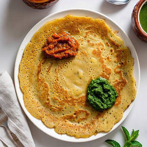 Plain Moong Dal Chilla With Tangy Imli And Mint Chutney