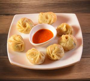 Steam momos veg[per plate 6 pecies]