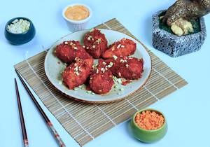 Wok Tossed Chicken Momos